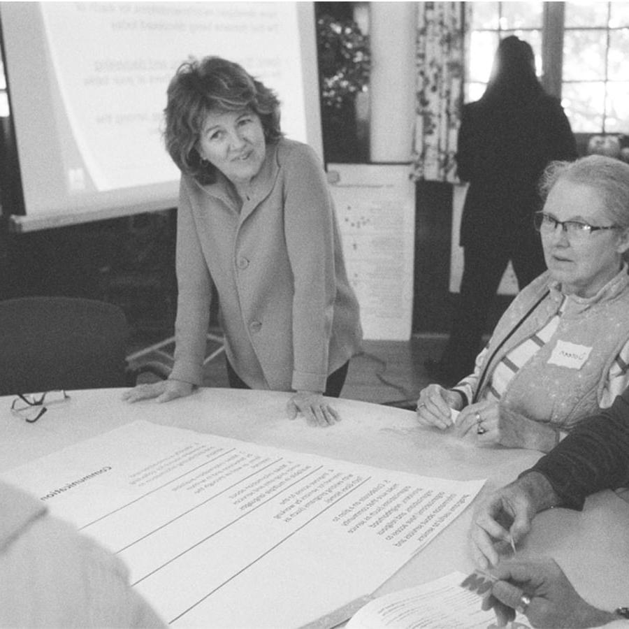 Jan Mutchler meets with seniors at the German Center in 2012.